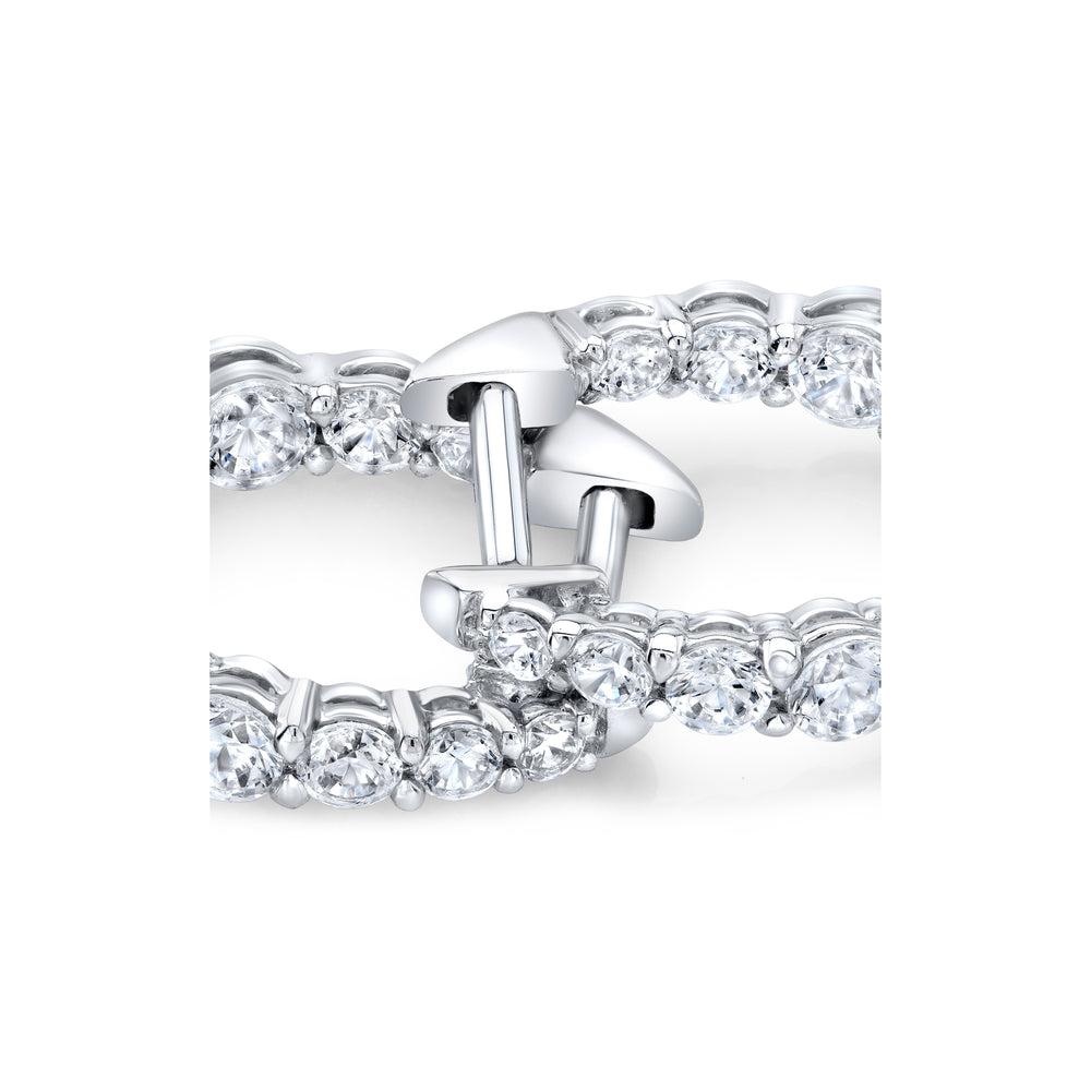 0.9 TCW Round Moissanite Huggies Earrings