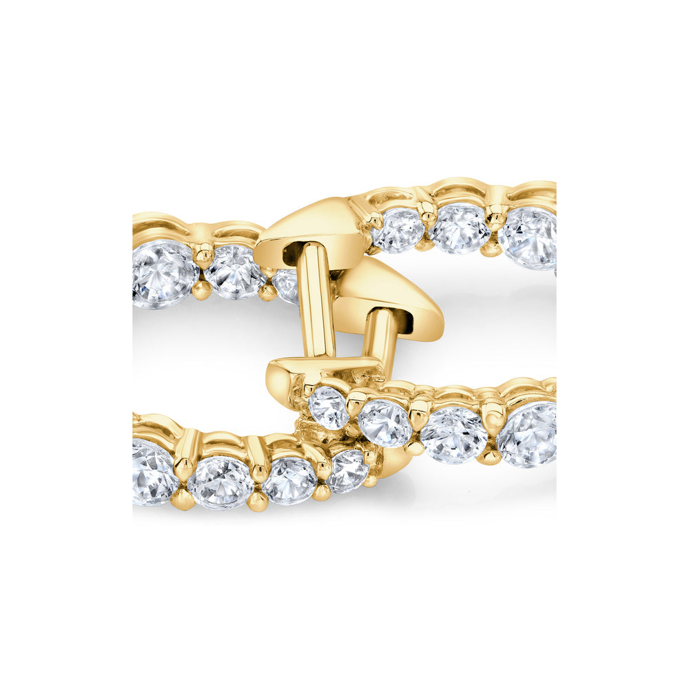 0.9 TCW Round Moissanite Huggies Earrings