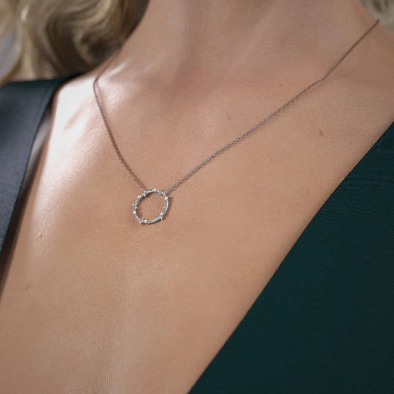 0.10 TCW Round Moissanite Round Twig Pendant Necklace