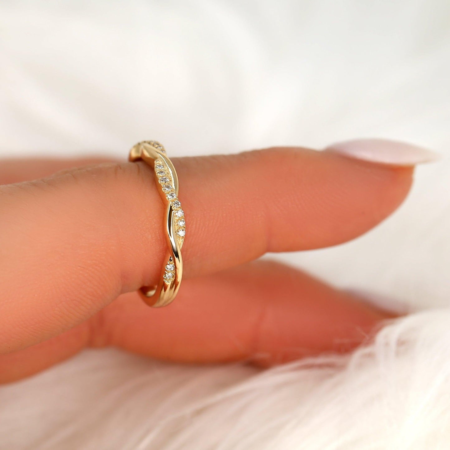 0.11 TCW Round Twisted Moissanite Wedding Band
