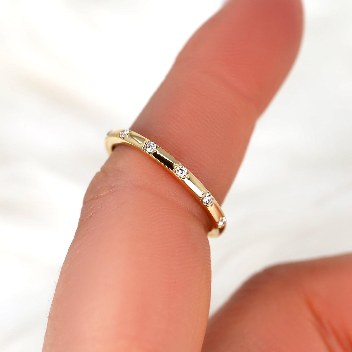 0.11 TCW Round Flush Setting Moissanite Wedding Band