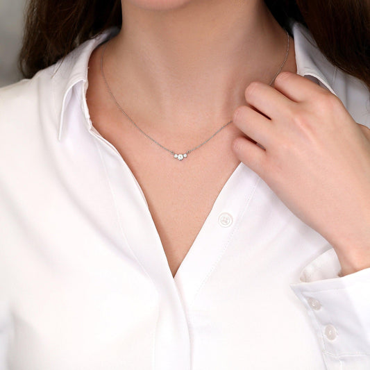 0.2 TCW Round Moissanite Three Stone Necklace