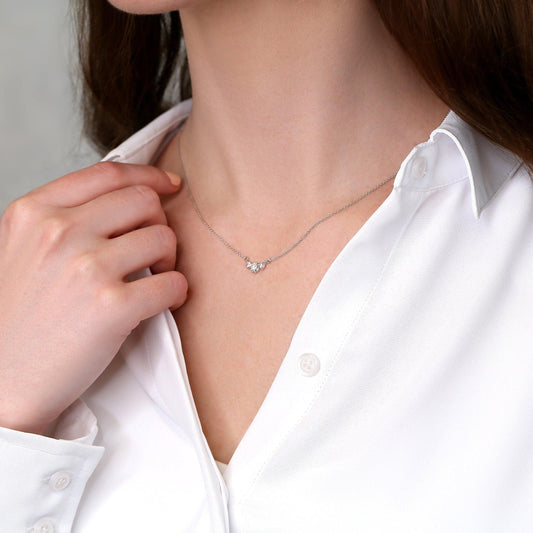 0.2 TCW Round Moissanite Three Stone Necklace