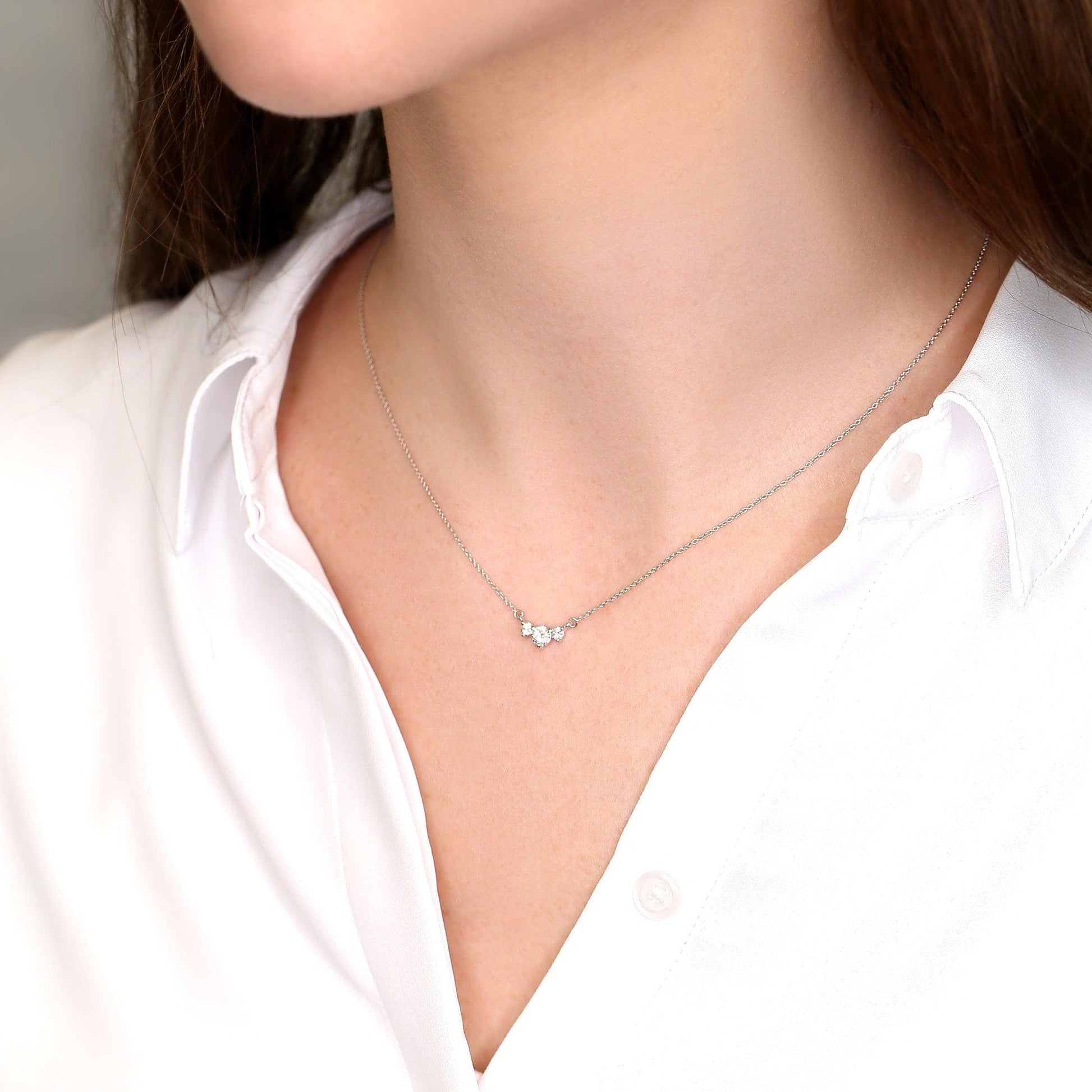 0.2 TCW Round Moissanite Three Stone Necklace