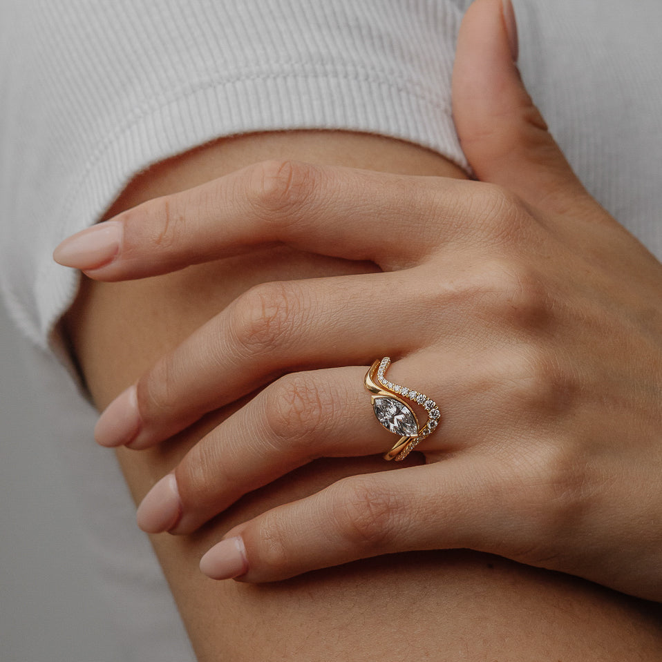 0.28 TCW Round Curved Moissanite Wedding Band