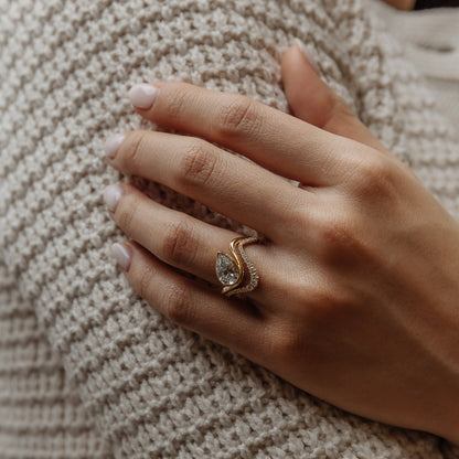 0.28 TCW Round Curved Moissanite Wedding Band
