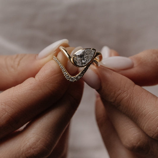0.28 TCW Round Curved Moissanite Wedding Band