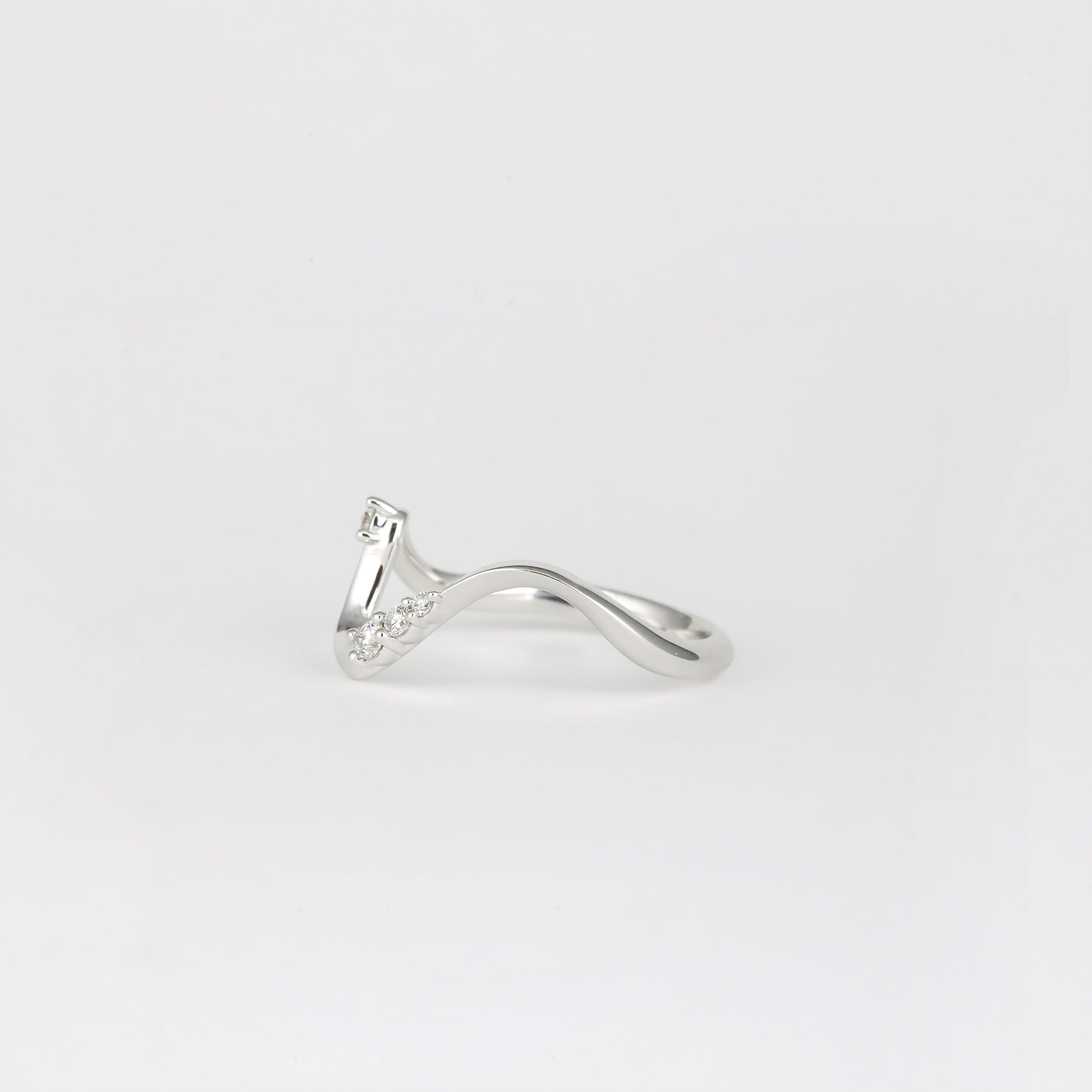 0.11 TCW Round Curved Moissanite Wedding Band