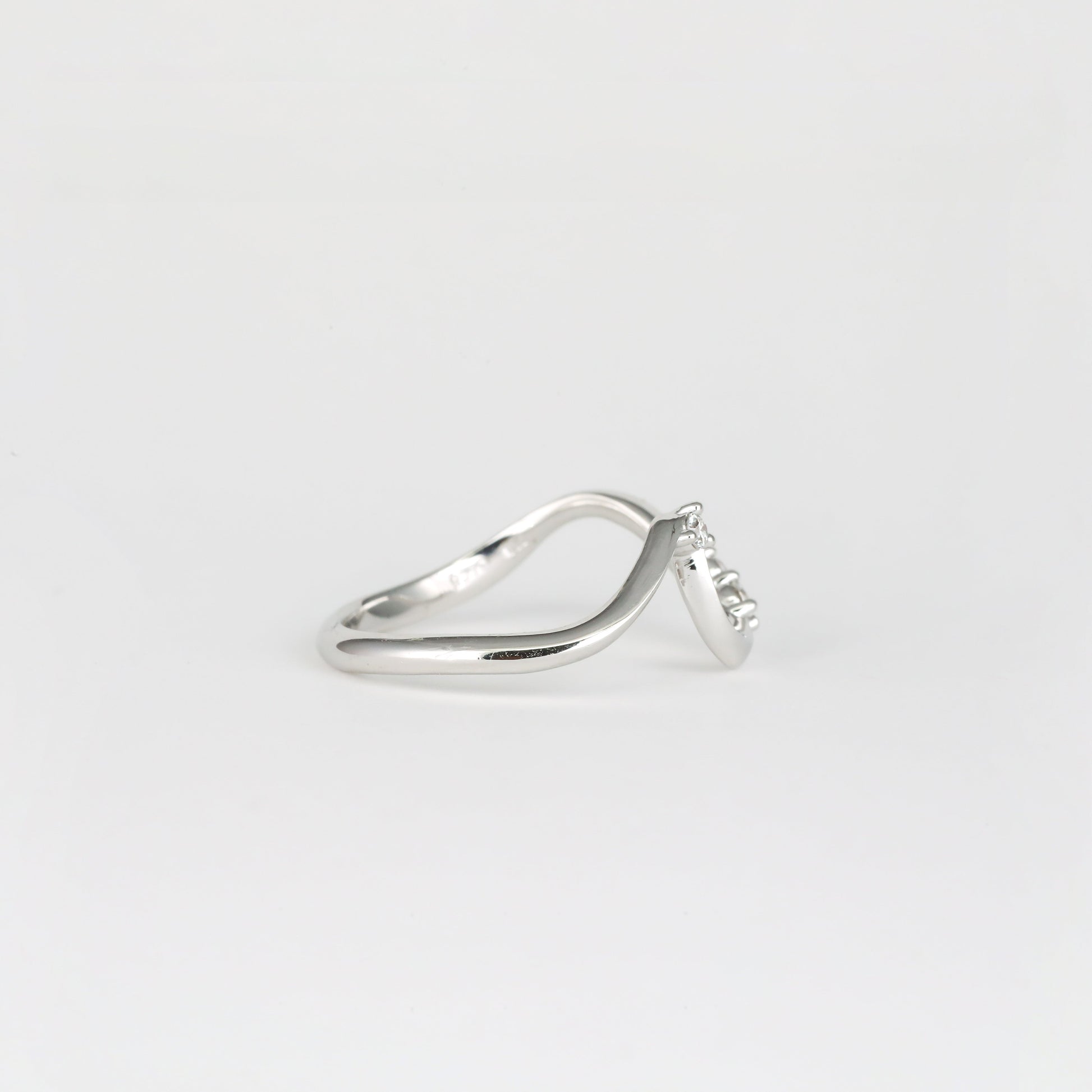 0.11 TCW Round Curved Moissanite Wedding Band