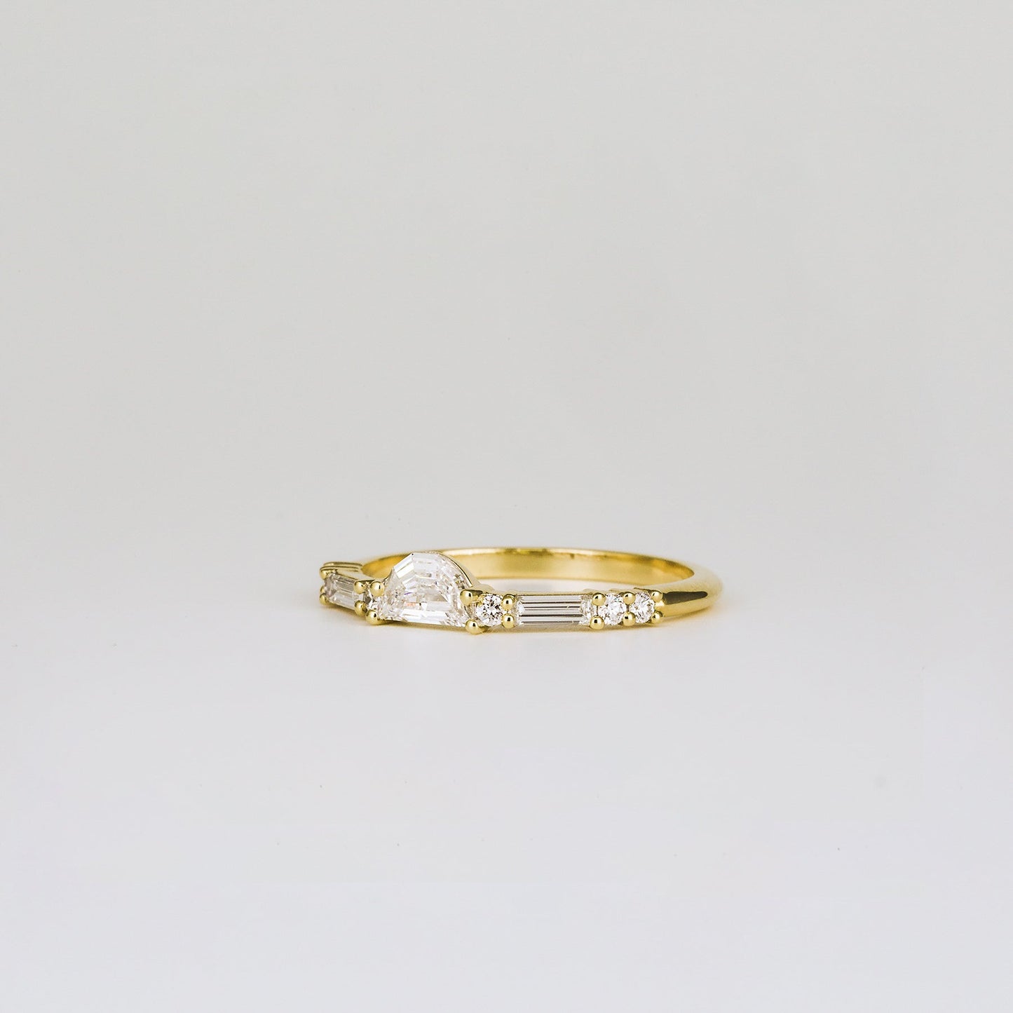 0.25 TCW Half-Moon, Round & Baguette Cluster Moissanite Wedding Band