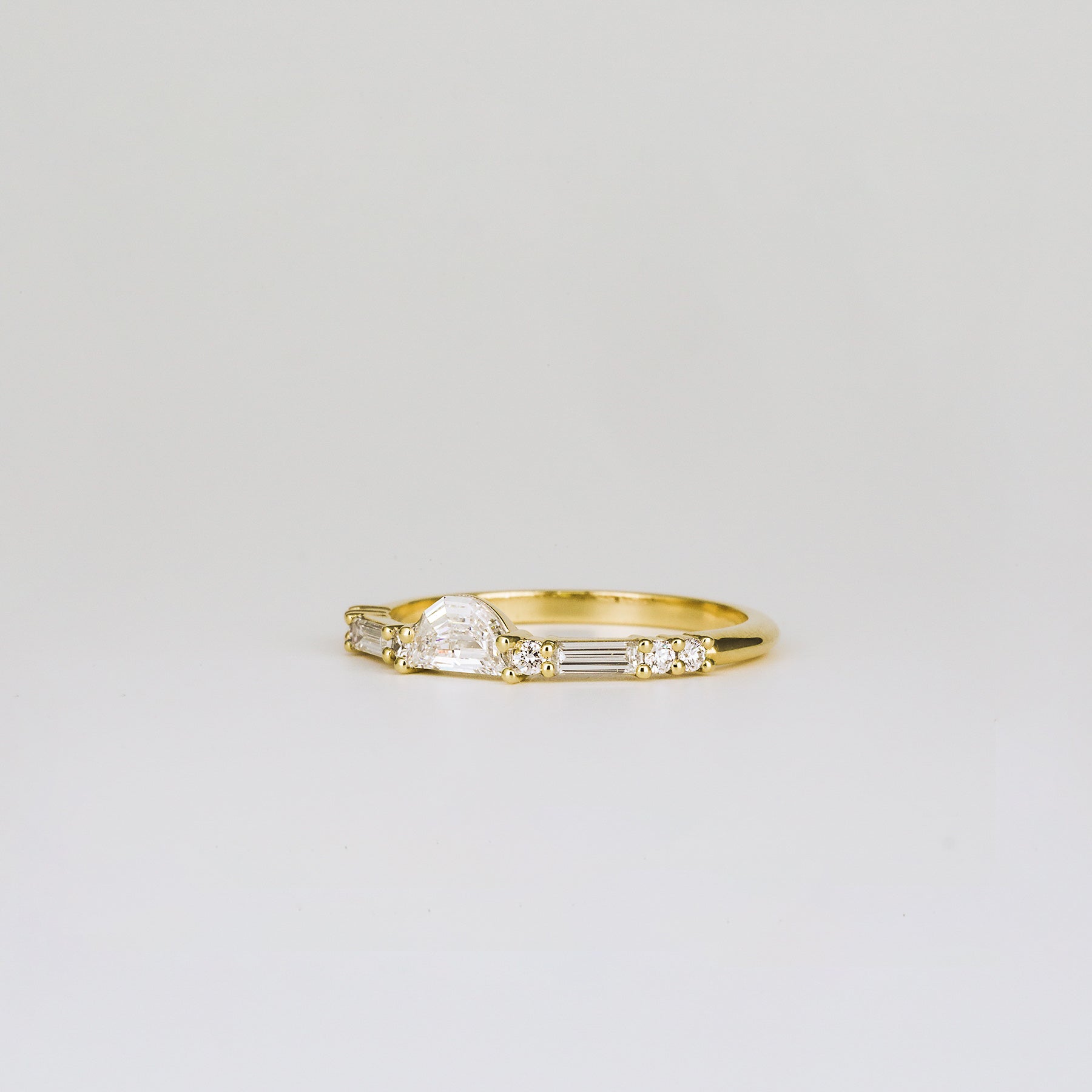 0.25 TCW Half-Moon, Round & Baguette Cluster Moissanite Wedding Band