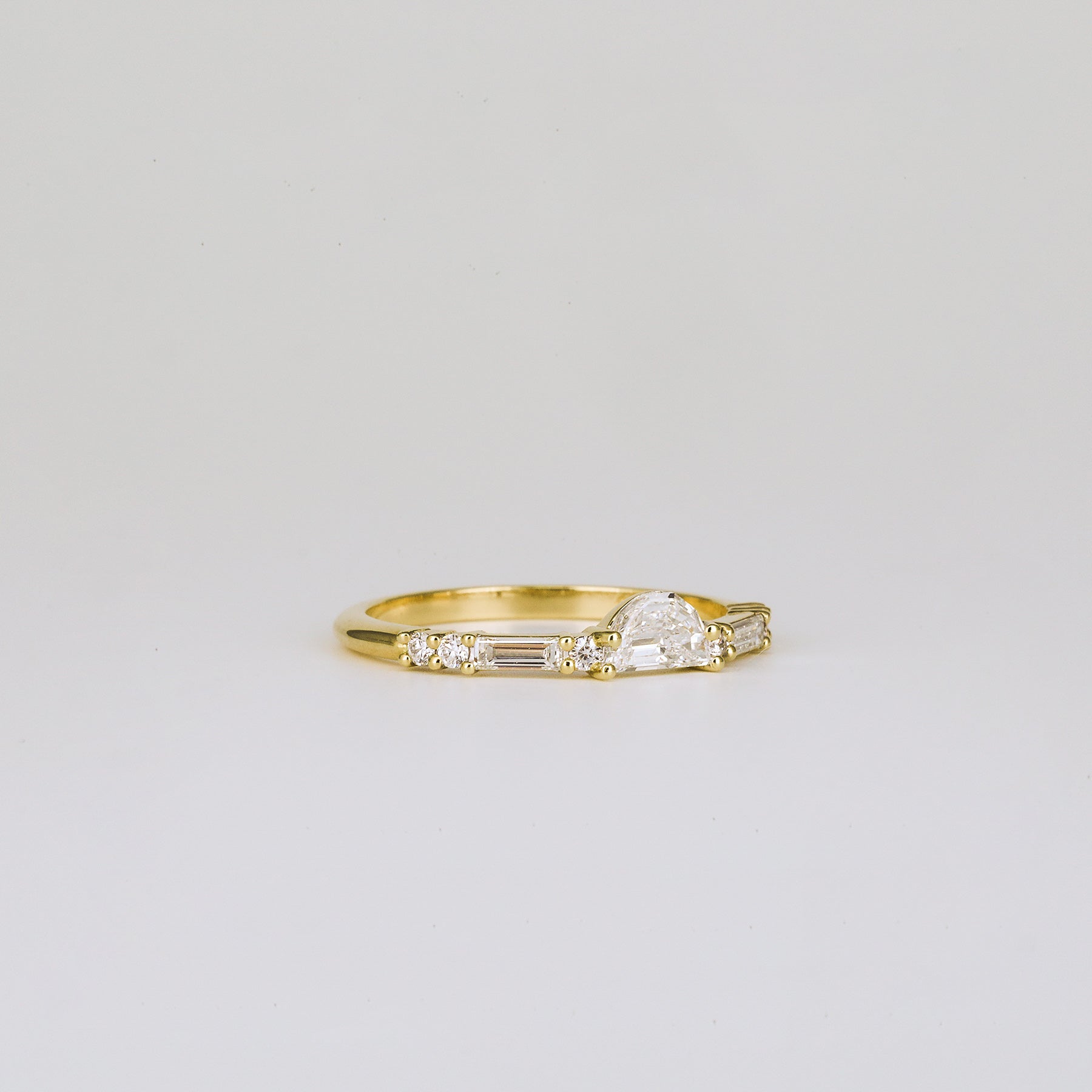 0.25 TCW Half-Moon, Round & Baguette Cluster Moissanite Wedding Band