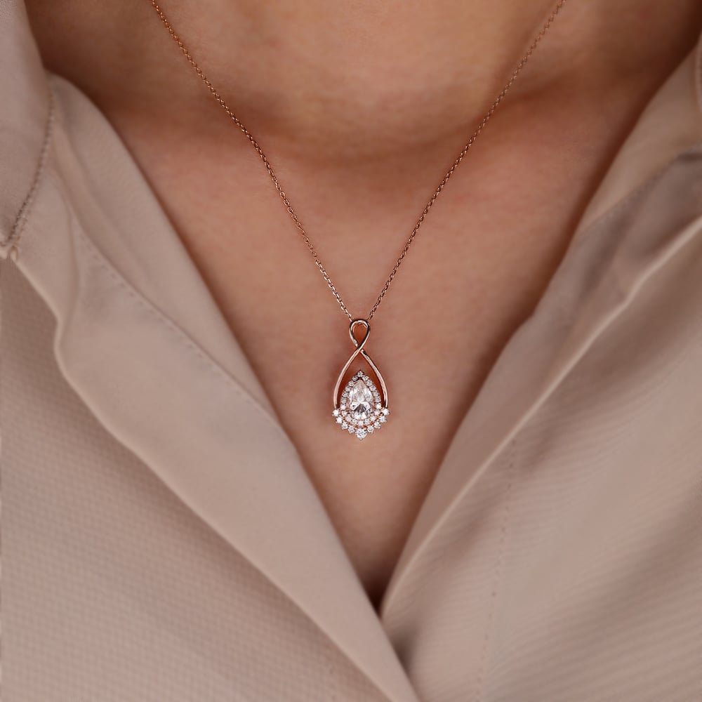 1.21 TCW Pear Moissanite Halo Necklace