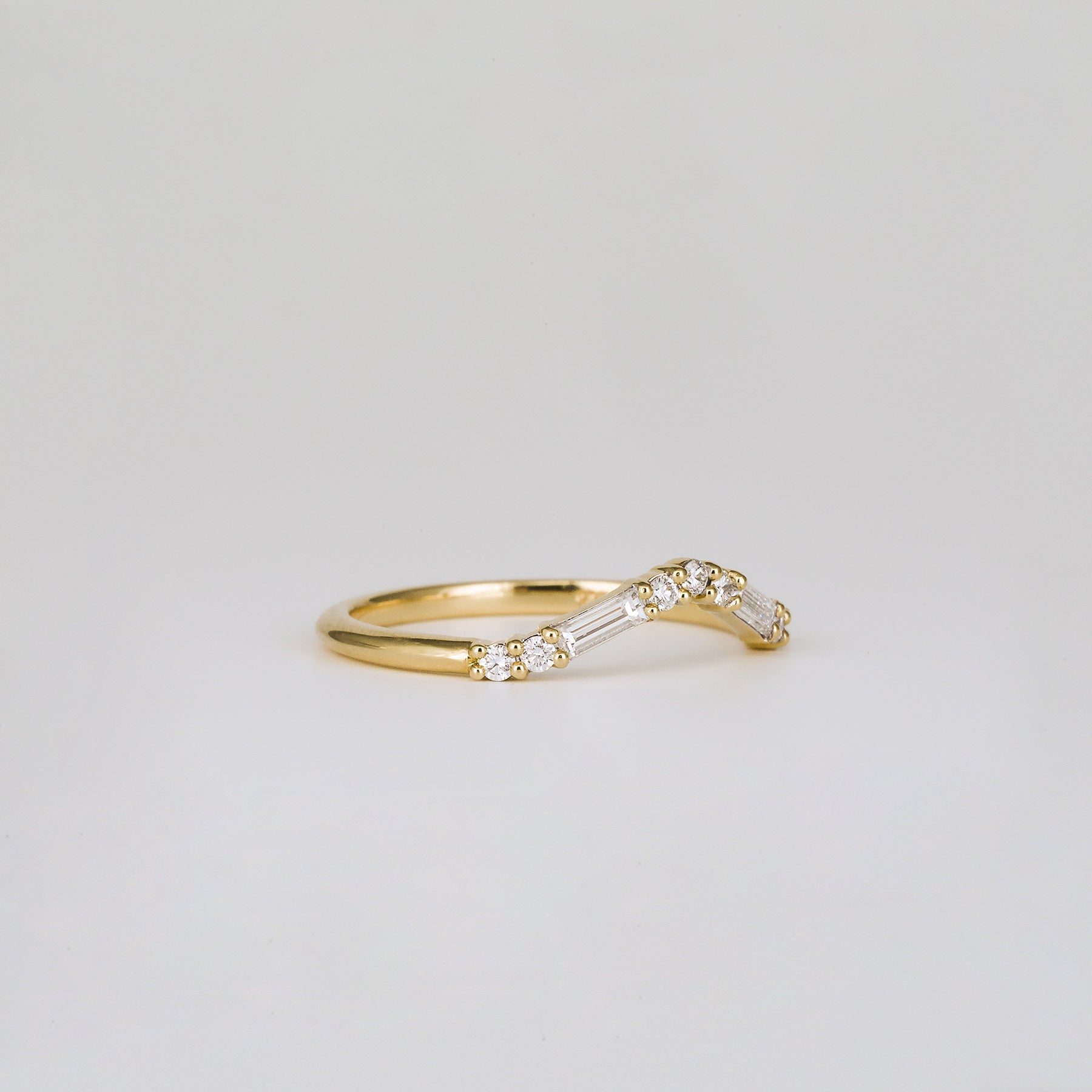 0.20 TCW Round & Baguette Curved Moissanite Wedding Band