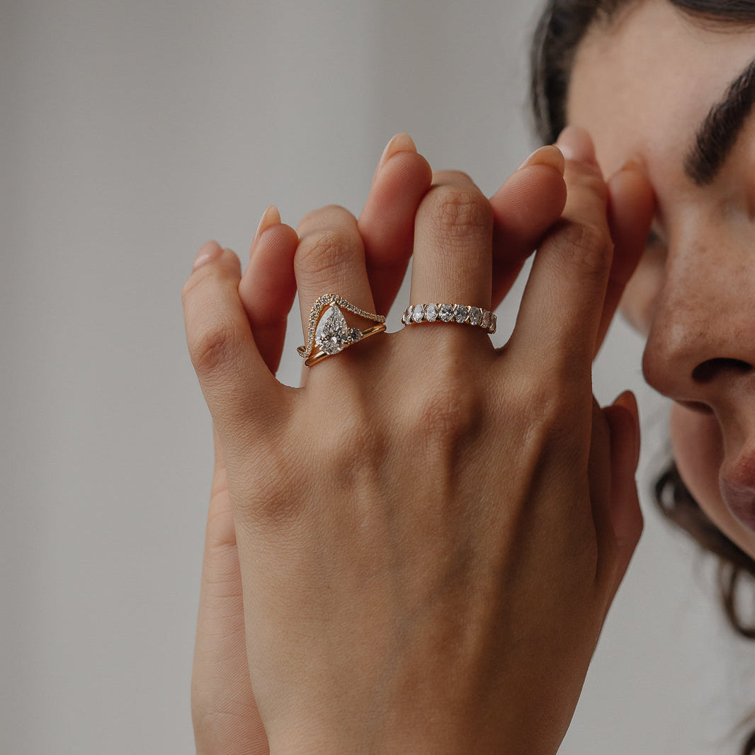 0.28 TCW Round Curved Moissanite Wedding Band