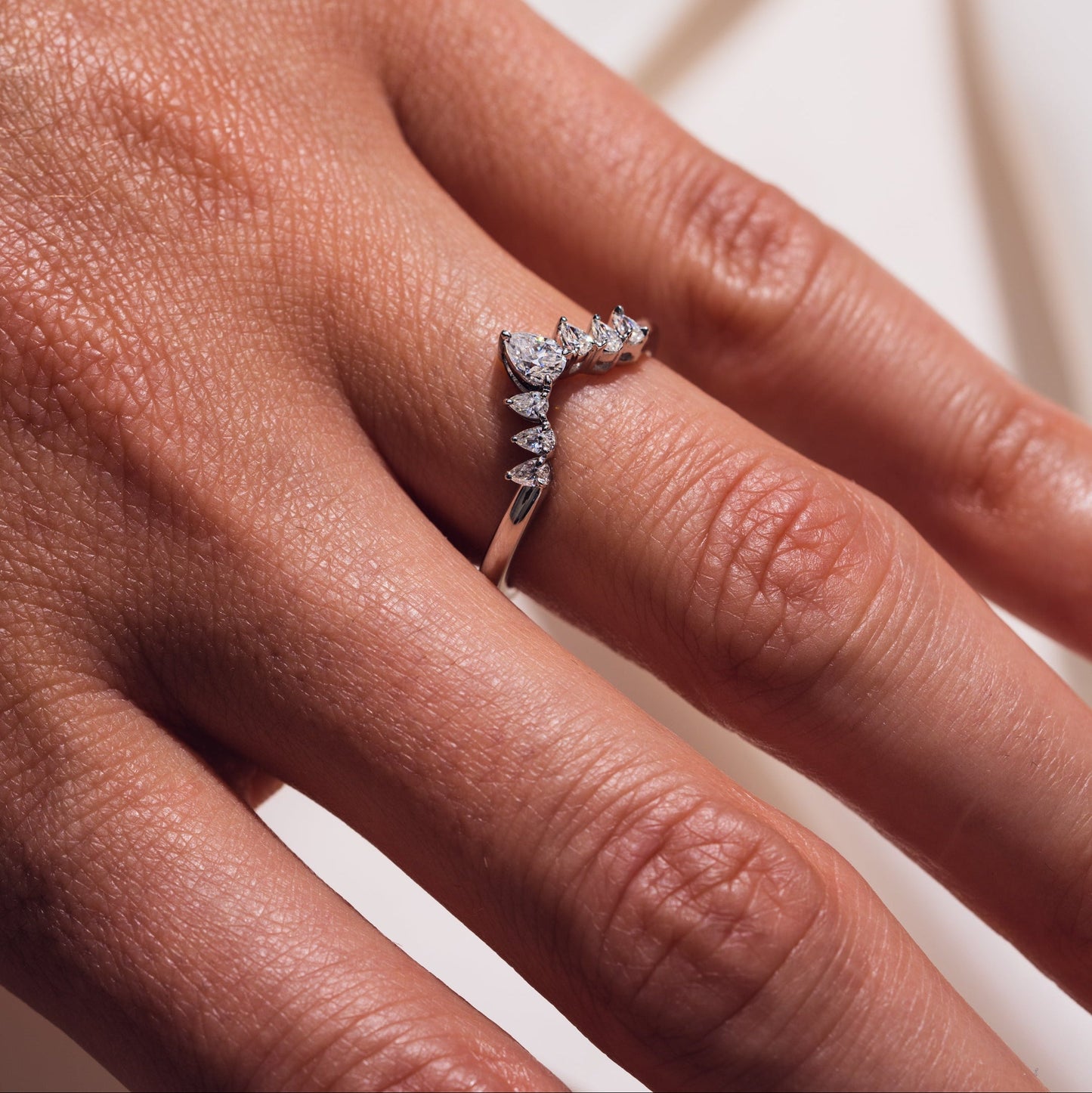 0.34 TCW Pear Curved Moissanite Wedding Band