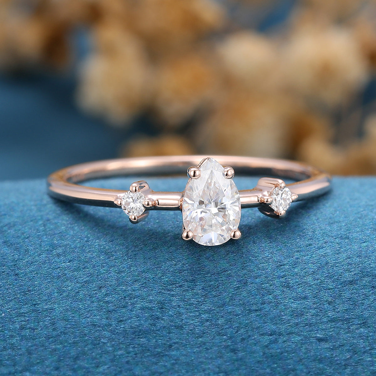 0.39 CT Pear Three Stone Moissanite Engagement Ring