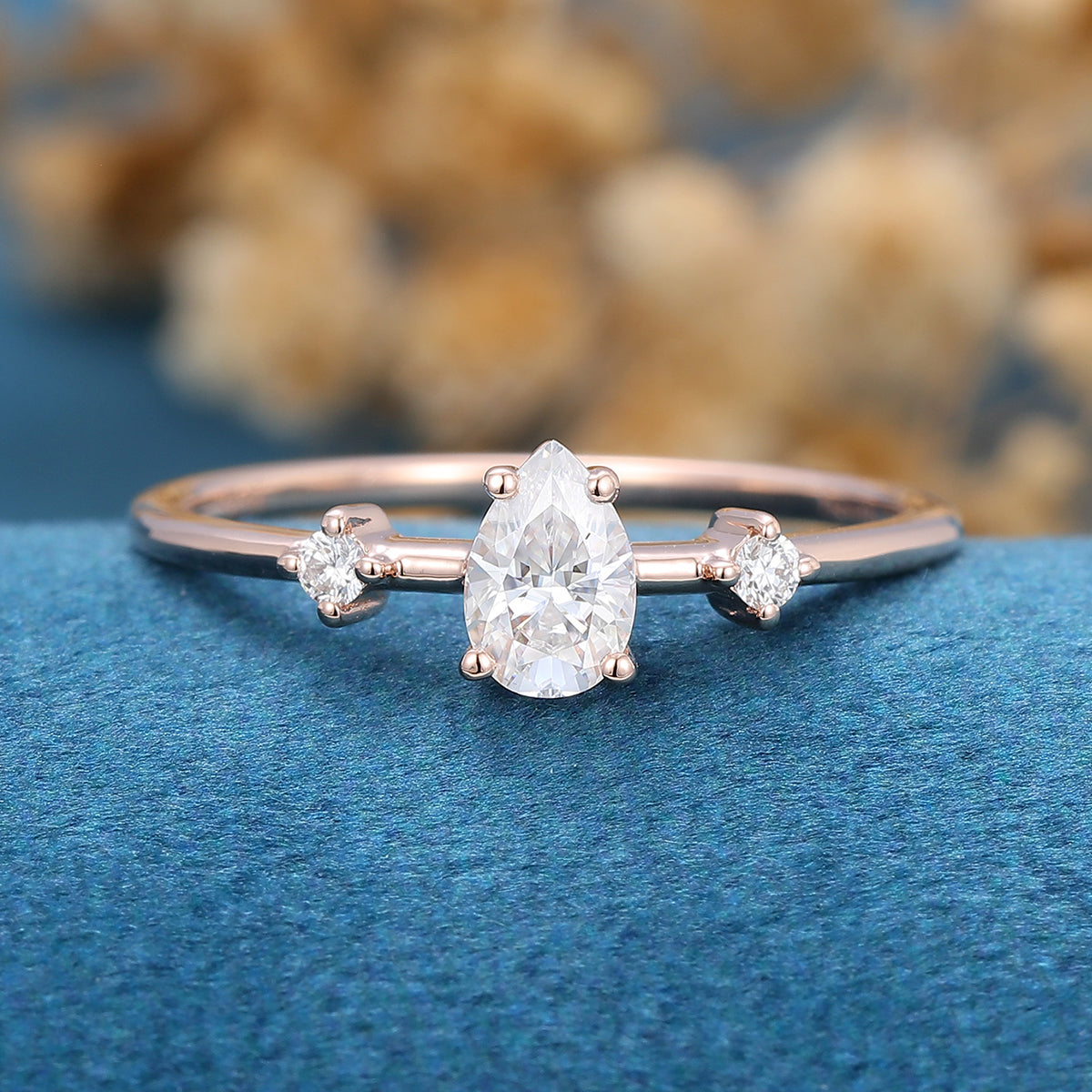 0.39 CT Pear Three Stone Moissanite Engagement Ring