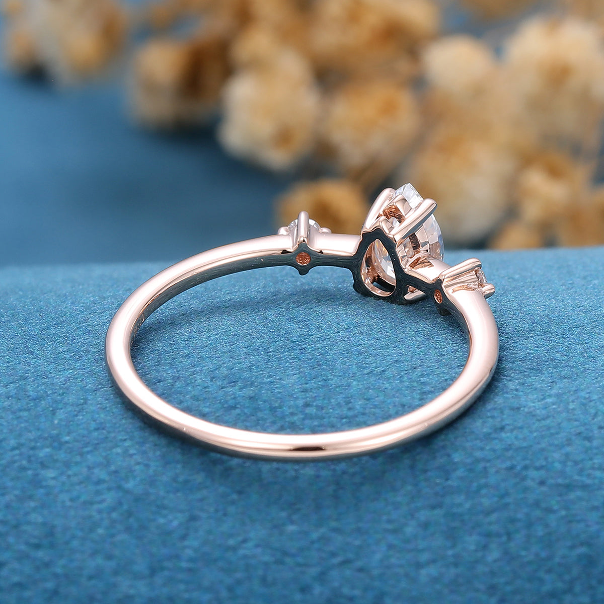 0.39 CT Pear Three Stone Moissanite Engagement Ring