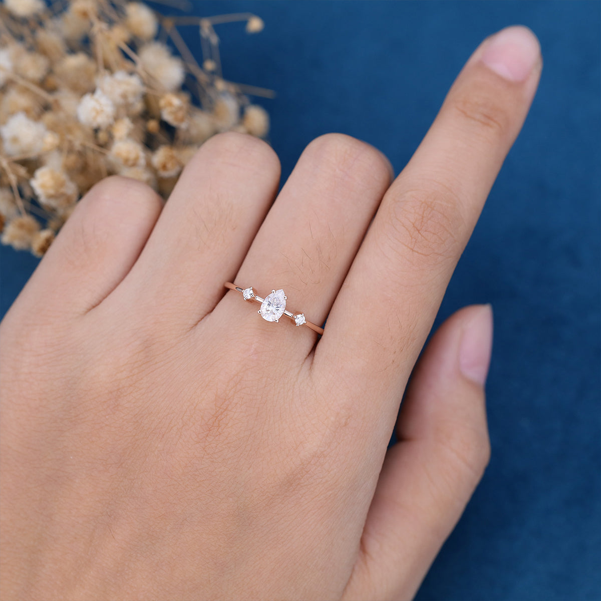 0.39 CT Pear Three Stone Moissanite Engagement Ring