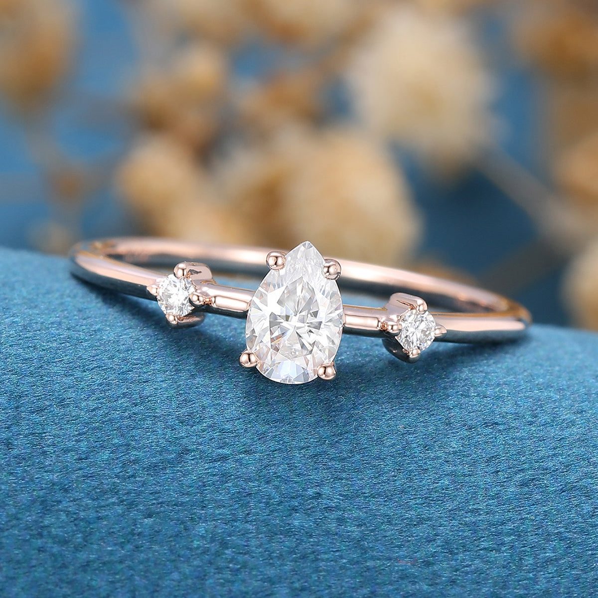 0.39 CT Pear Three Stone Moissanite Engagement Ring