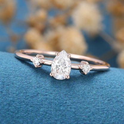 0.39 CT Pear Three Stone Moissanite Engagement Ring