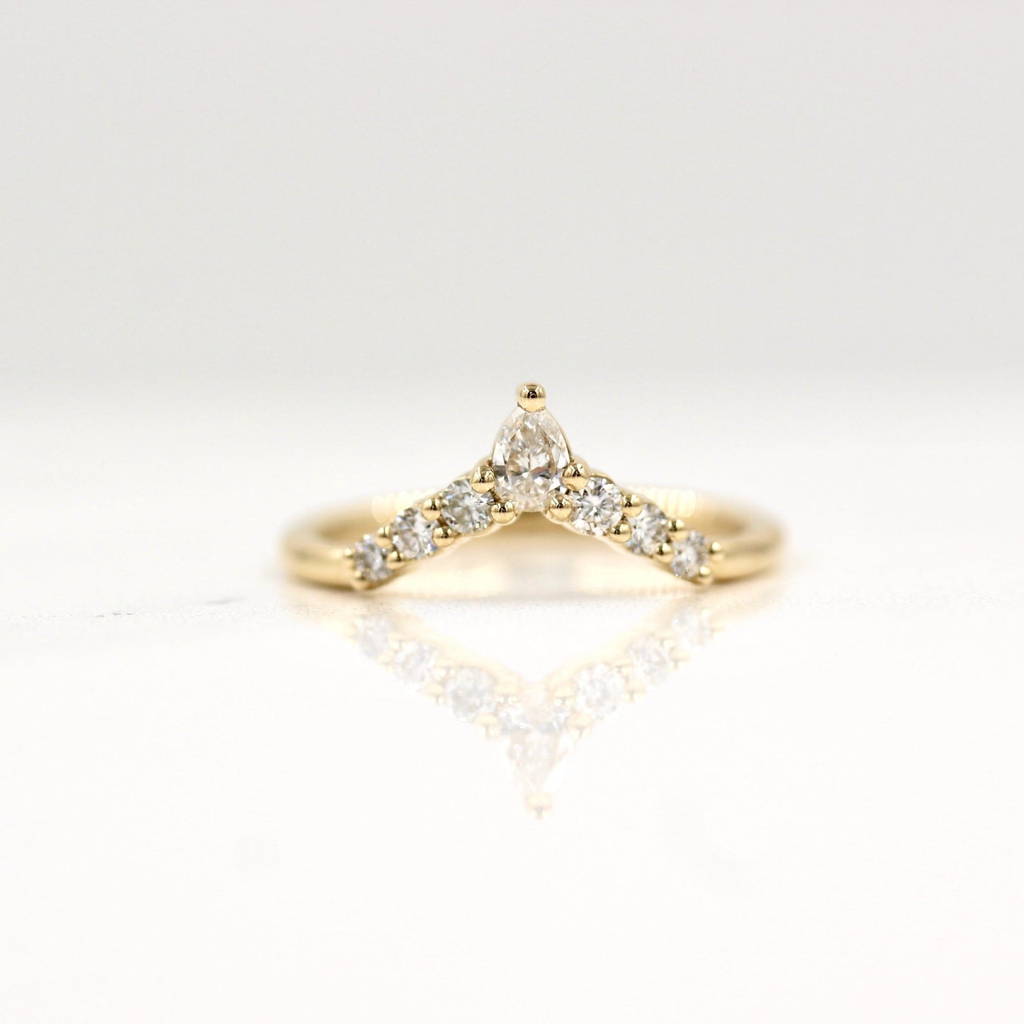 0.31 TCW Round & Pear Curved Moissanite Wedding Band