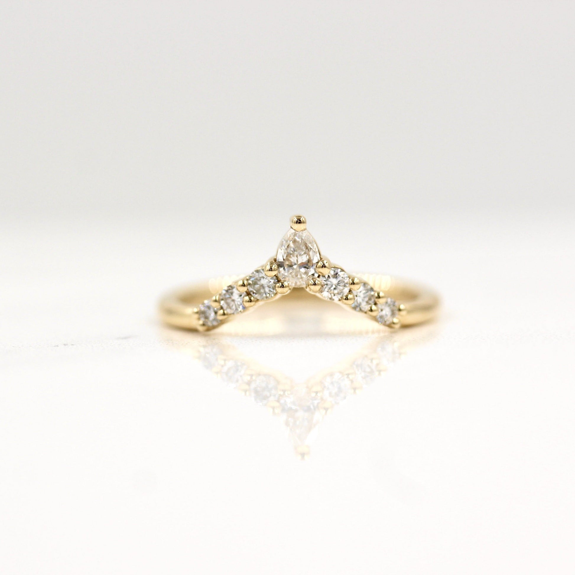 0.31 TCW Round & Pear Curved Moissanite Wedding Band