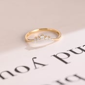 0.1 TCW Round Curved Moissanite Wedding Band