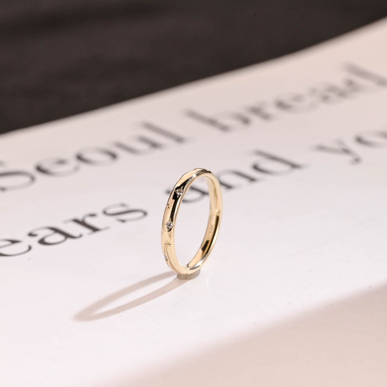 0.1 TCW Round Flush Setting Moissanite Wedding Band