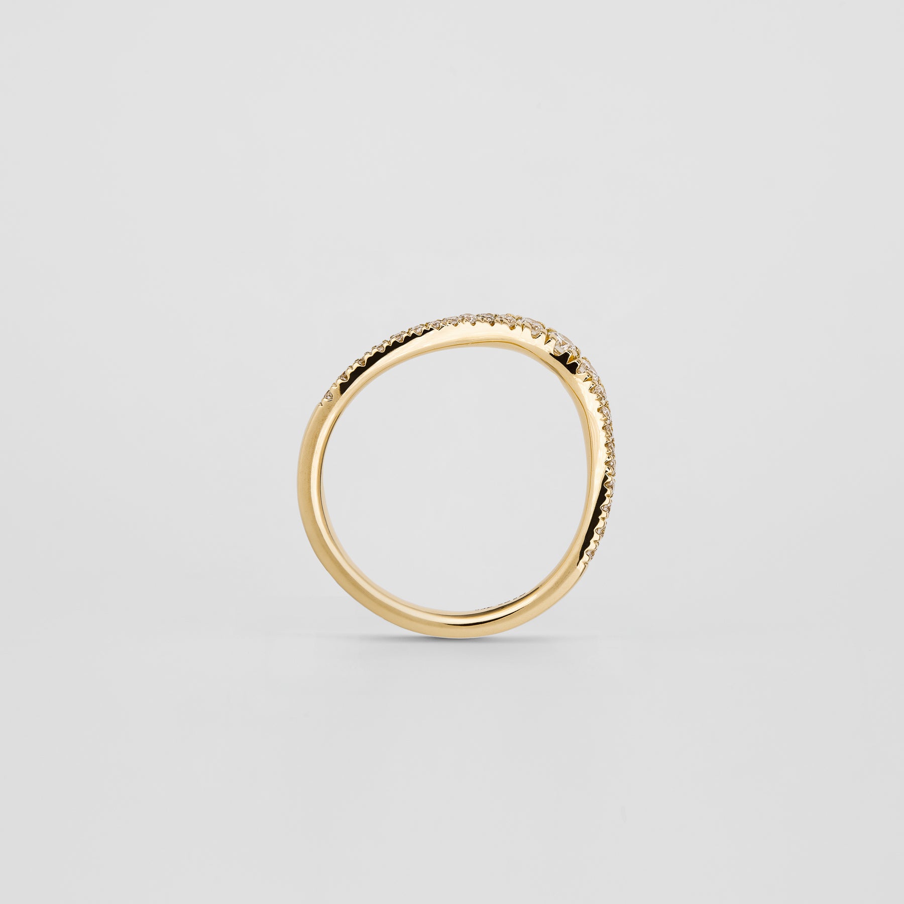 0.20 TCW Round Curved Moissanite Wedding Band