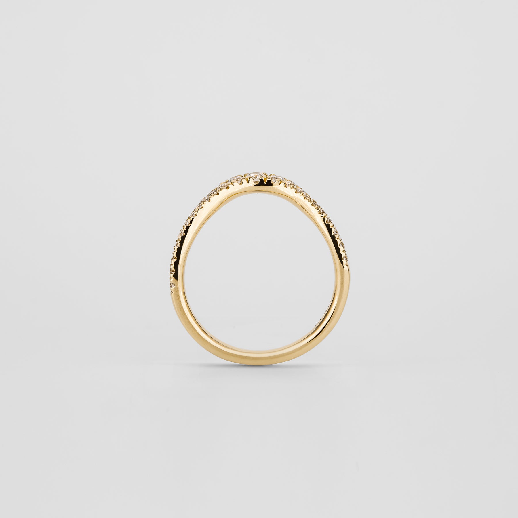 0.20 TCW Round Curved Moissanite Wedding Band