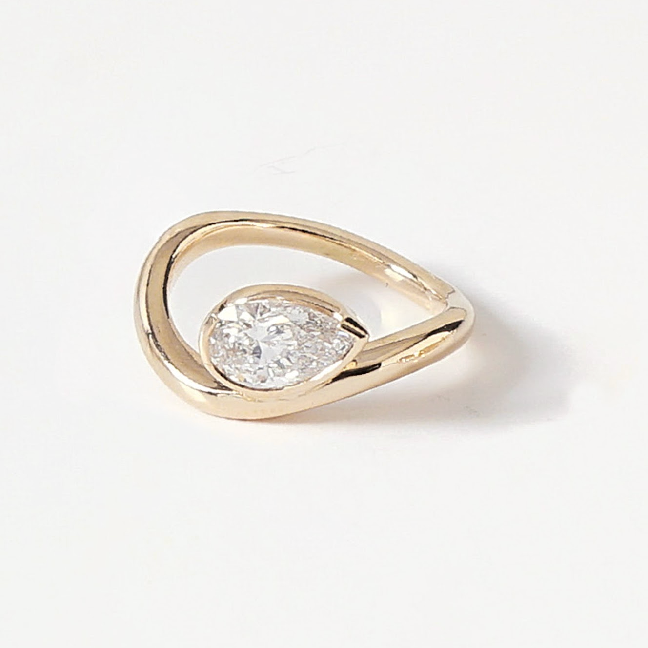 0.79 CT Pear Half Bezel Moissanite Engagement Ring