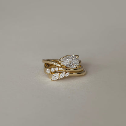 0.1 TCW Round Curved Moissanite Wedding Band