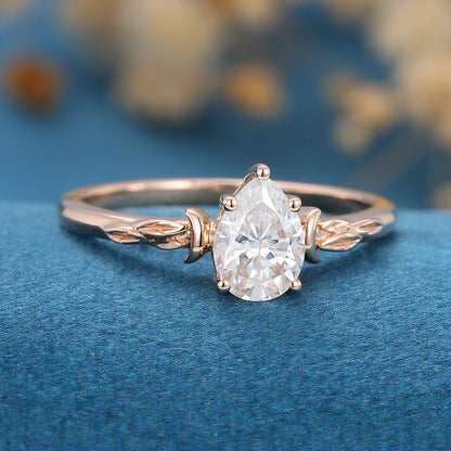 0.69 CT Pear Solitaire Moissanite Engagement Ring