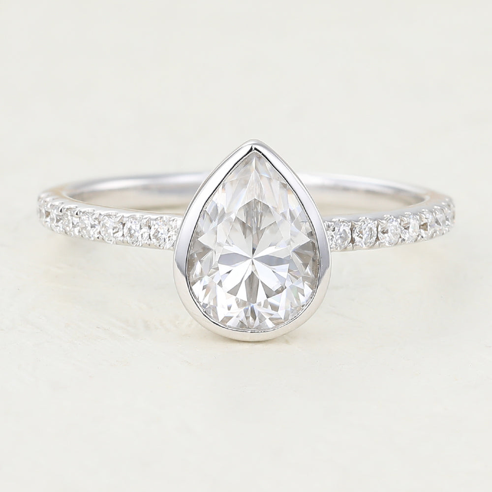 1 CT Pear Shaped Moissanite Engagement Ring In Pave Design