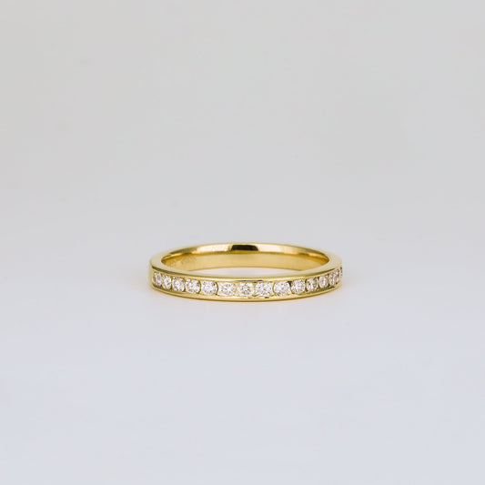 0.32 TCW Round Channel Setting Moissanite Wedding Band
