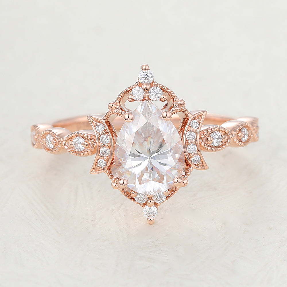 0.9 CT Pear Shaped Moissanite Engagement Ring In Cluster Design