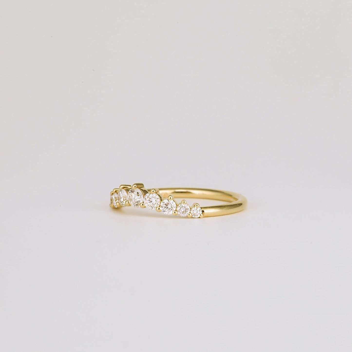0.31 TCW Round Curved Moissanite Wedding Band