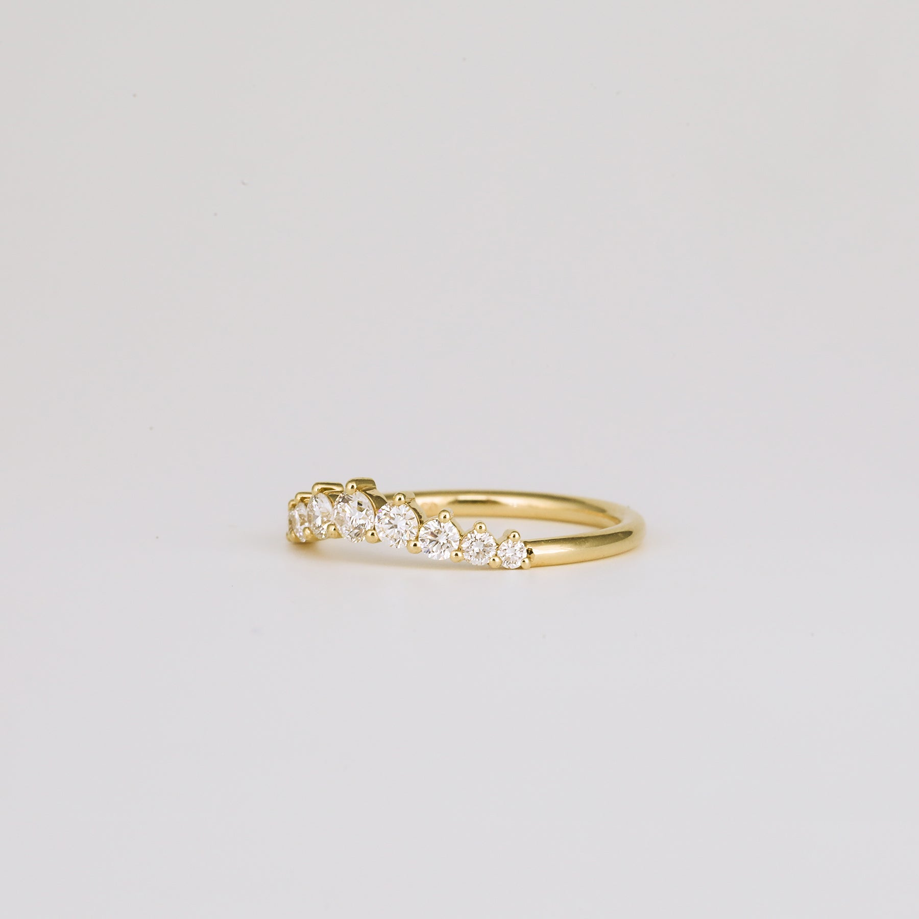 0.31 TCW Round Curved Moissanite Wedding Band