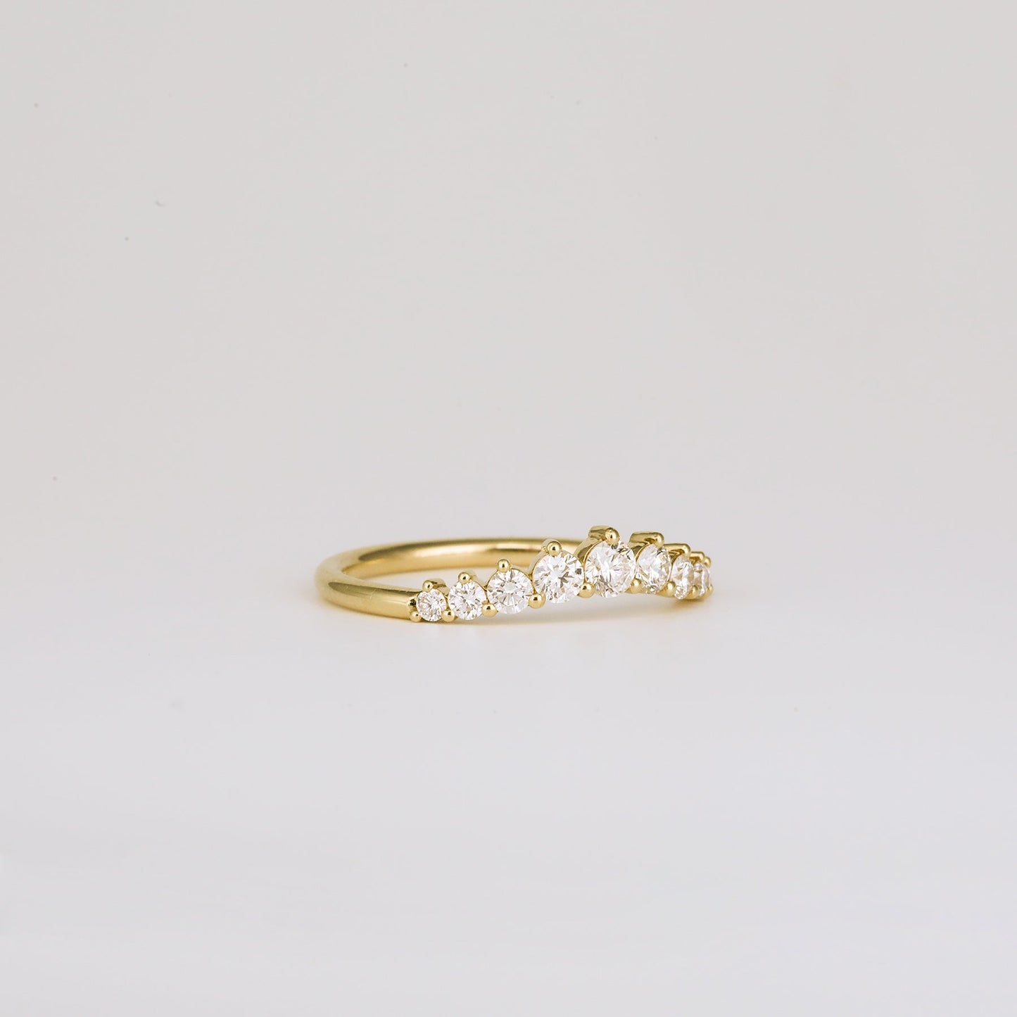 0.31 TCW Round Curved Moissanite Wedding Band