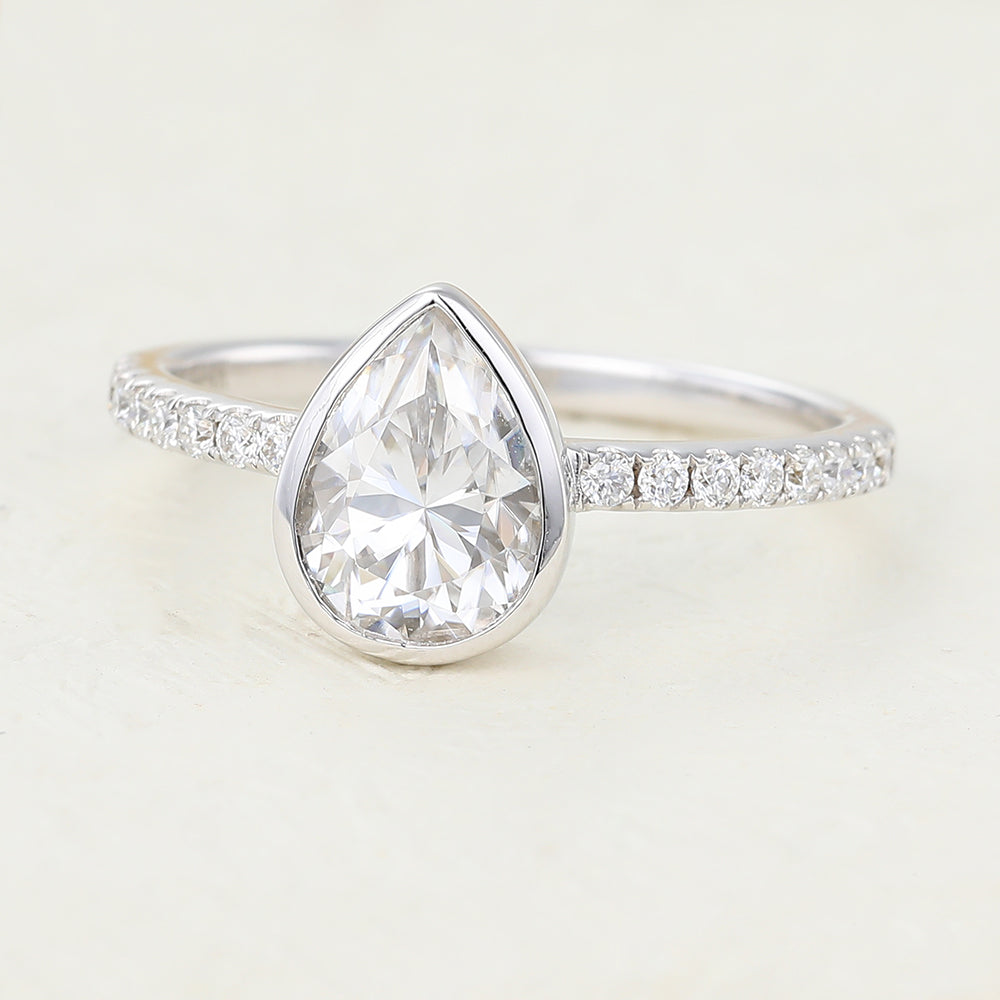 1 CT Pear Shaped Moissanite Engagement Ring In Pave Design