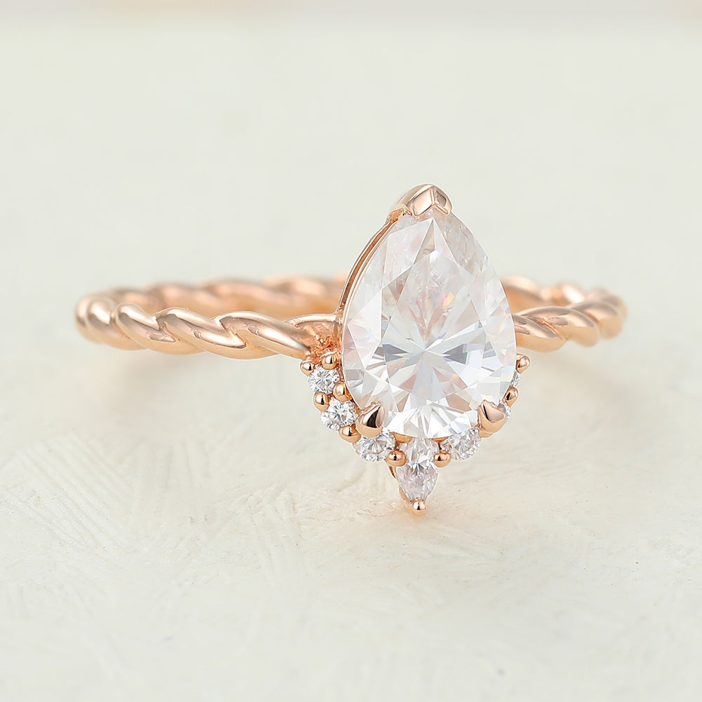 0.9 CT Pear Shaped Moissanite Engagement Ring In Cluster Design