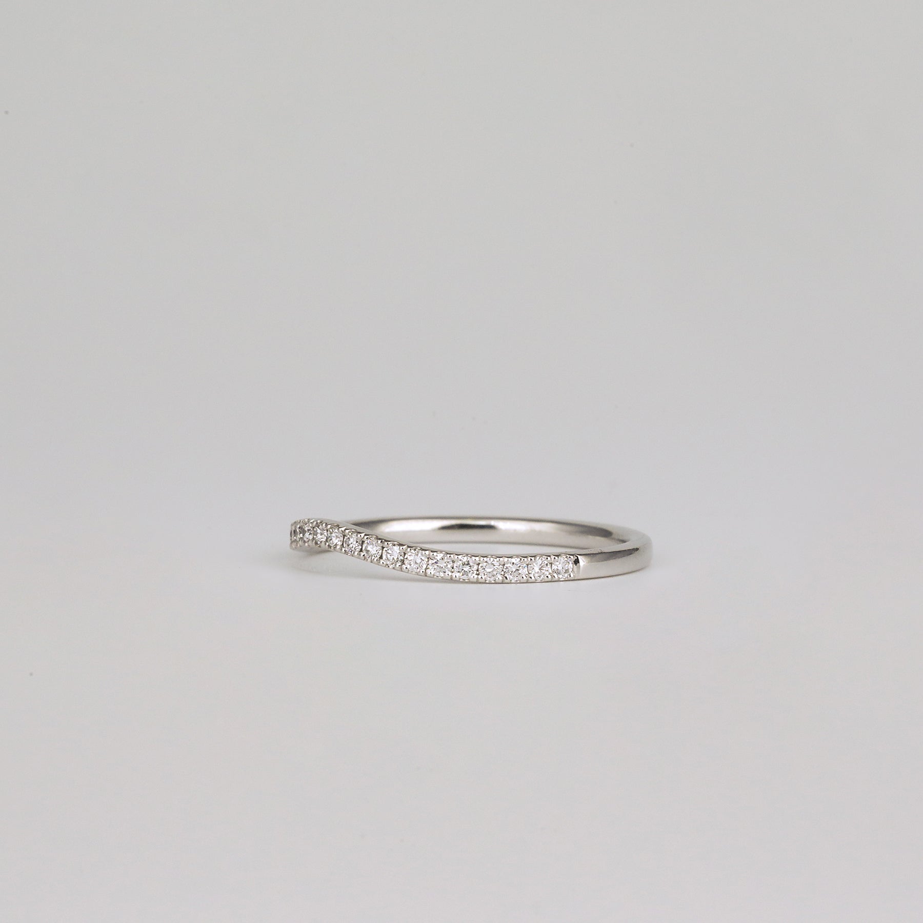 0.21 TCW Round Curved Moissanite Wedding Band