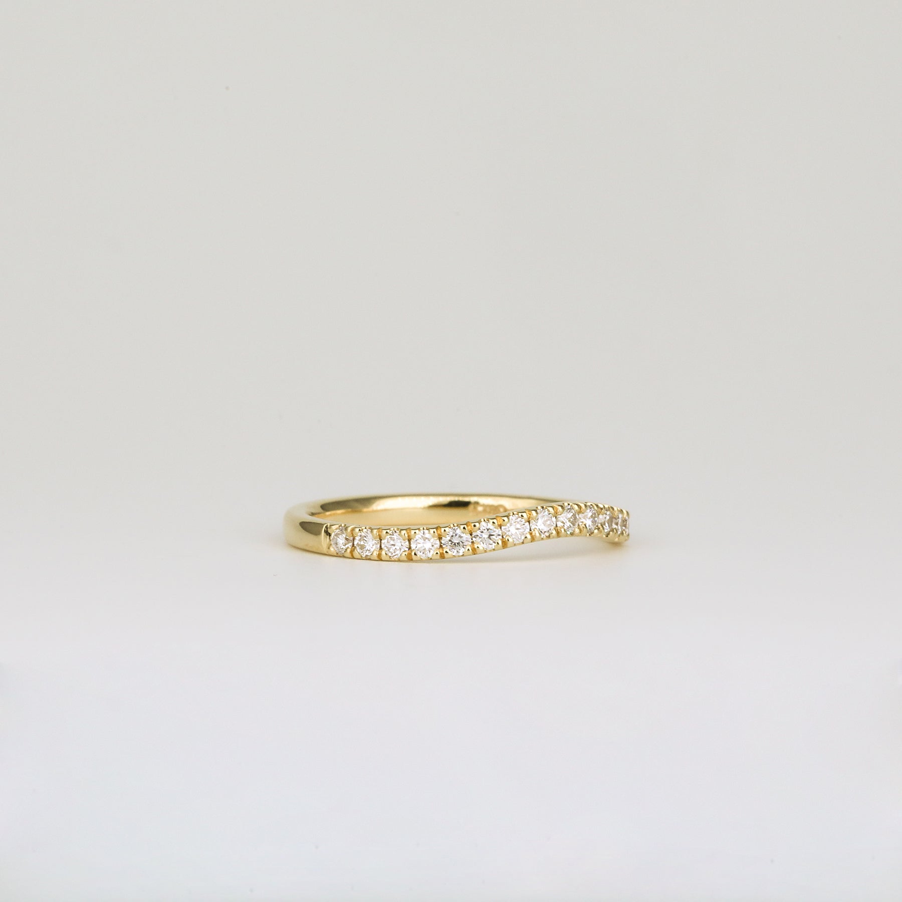 0.33 TCW Round Curved Moissanite Wedding Band
