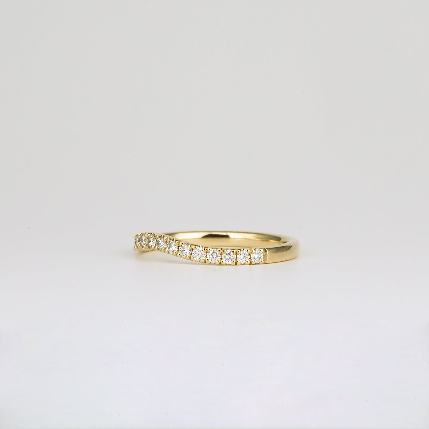 0.33 TCW Round Curved Moissanite Wedding Band