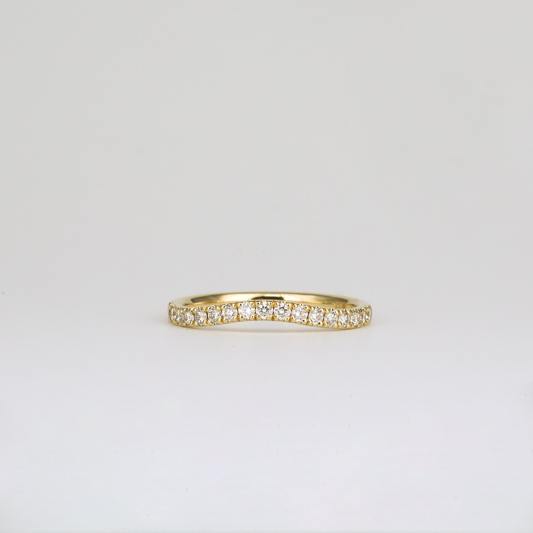 0.33 TCW Round Curved Moissanite Wedding Band