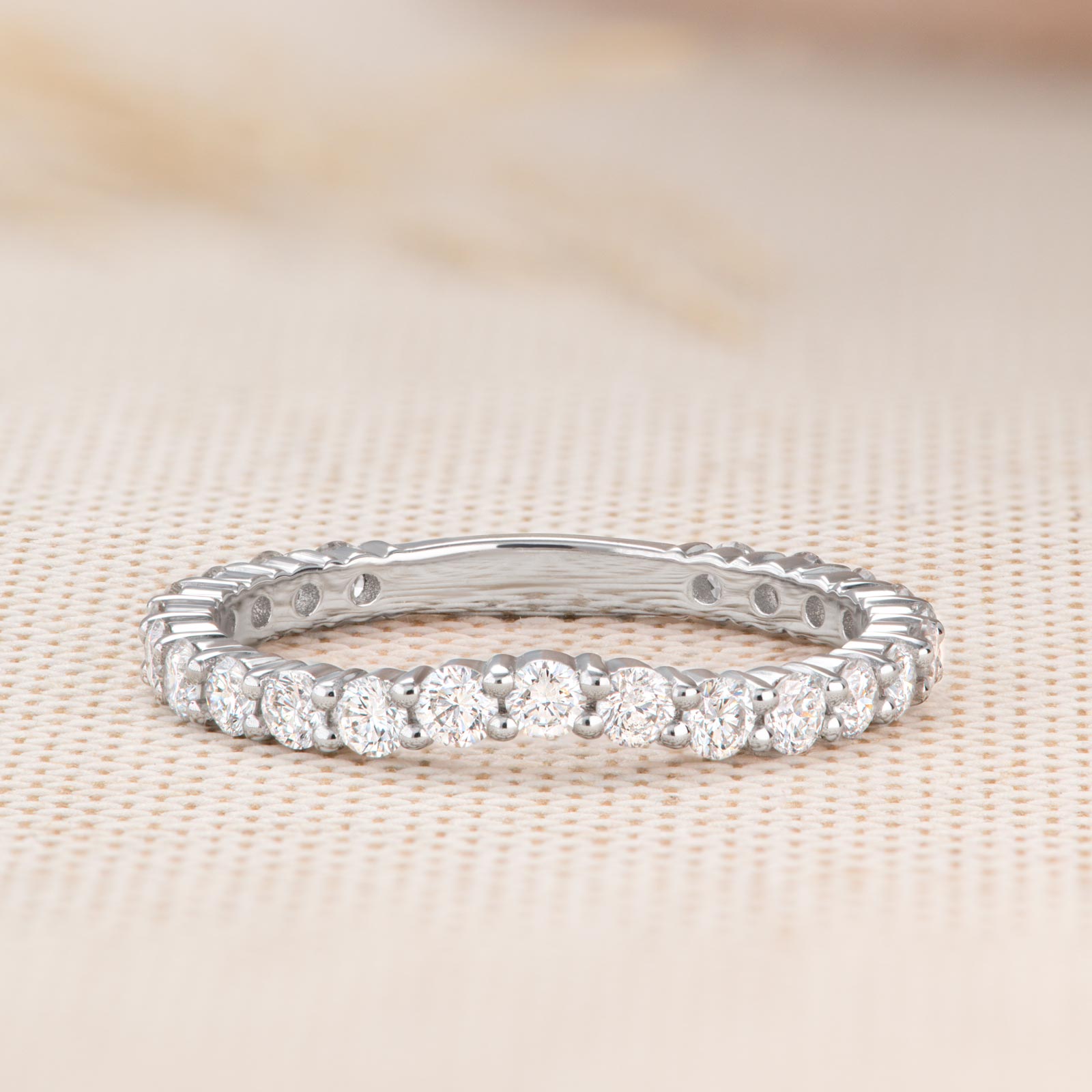 0.63 TCW Round Curved Moissanite Wedding Band