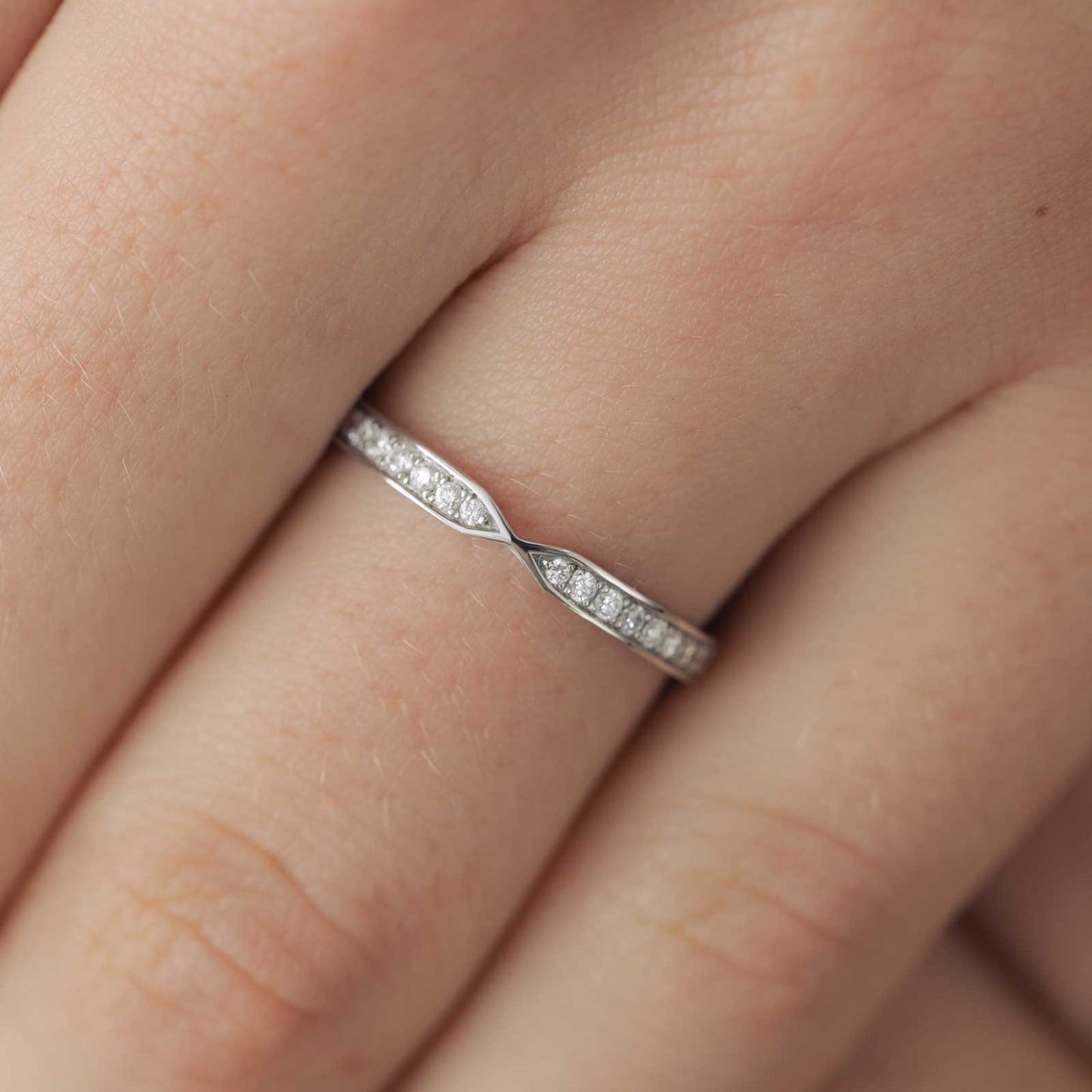 0.22 TCW Round Channel Setting Moissanite Wedding Band
