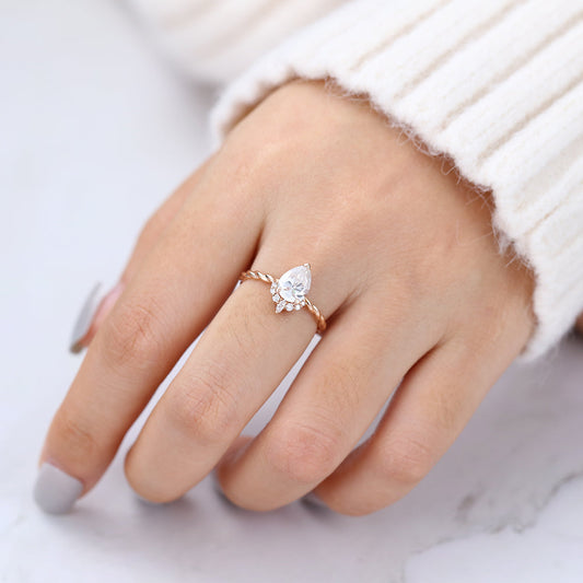 0.9 CT Pear Shaped Moissanite Engagement Ring In Cluster Design
